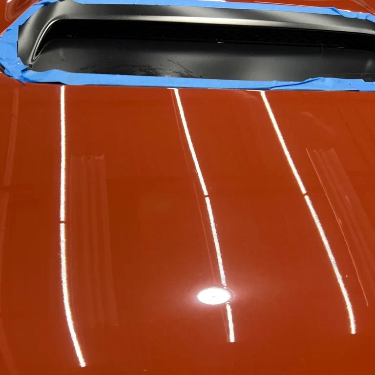 Close up of paint defects treated with Burn Out reconditioning cream