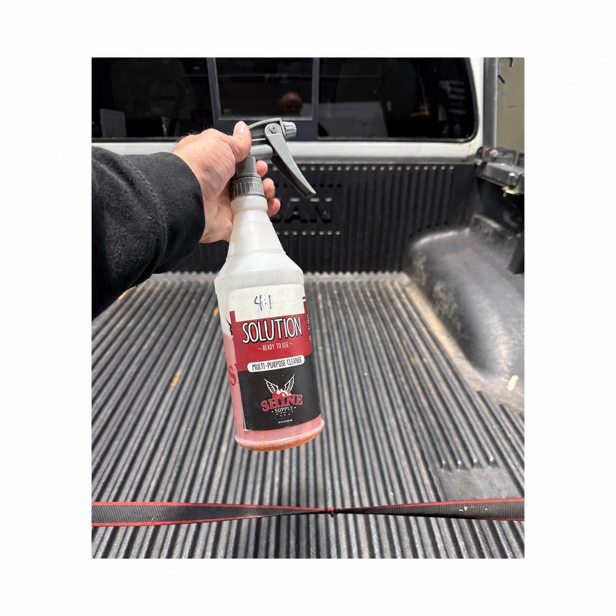 Before: dirty, stained truck bed liner prior to cleaning with Solution diluted 4:1